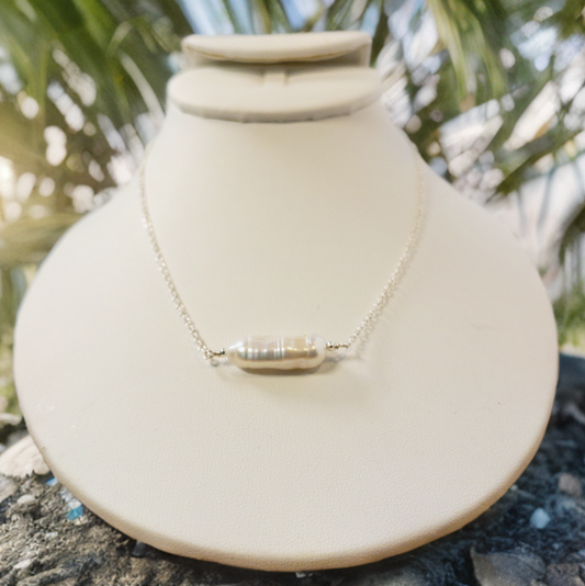 This is a 16 inch necklace made from tiny and delicate sterling silver cable chain.  It includes one natural white Biwa freshwater pearl