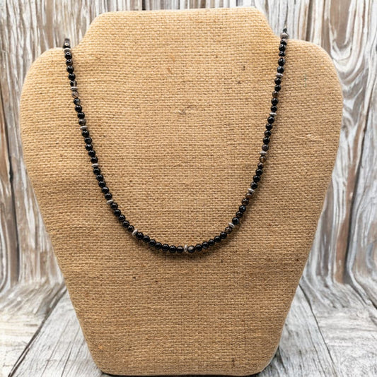 16 inches in length with a 2 inch extender this necklace is made with 4 mm round black banded agate.  