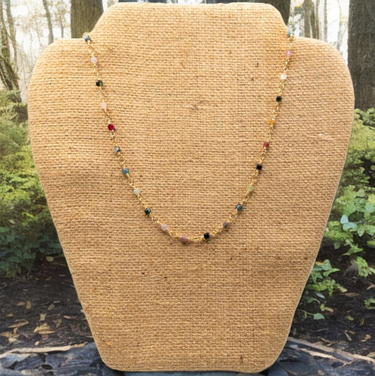 16 inches in length with a 2 inch extender this necklace is made with individually wire wrapped cube shaped tourmaline beads to create the chain.  