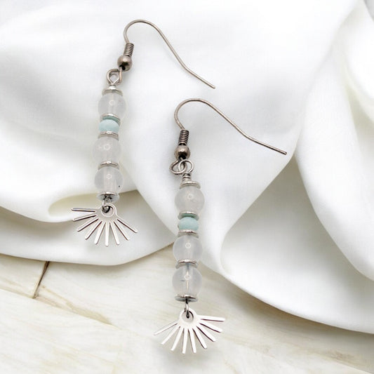 Pair of beaded earrings made with blue moonstone and larimar with sunburst charms 