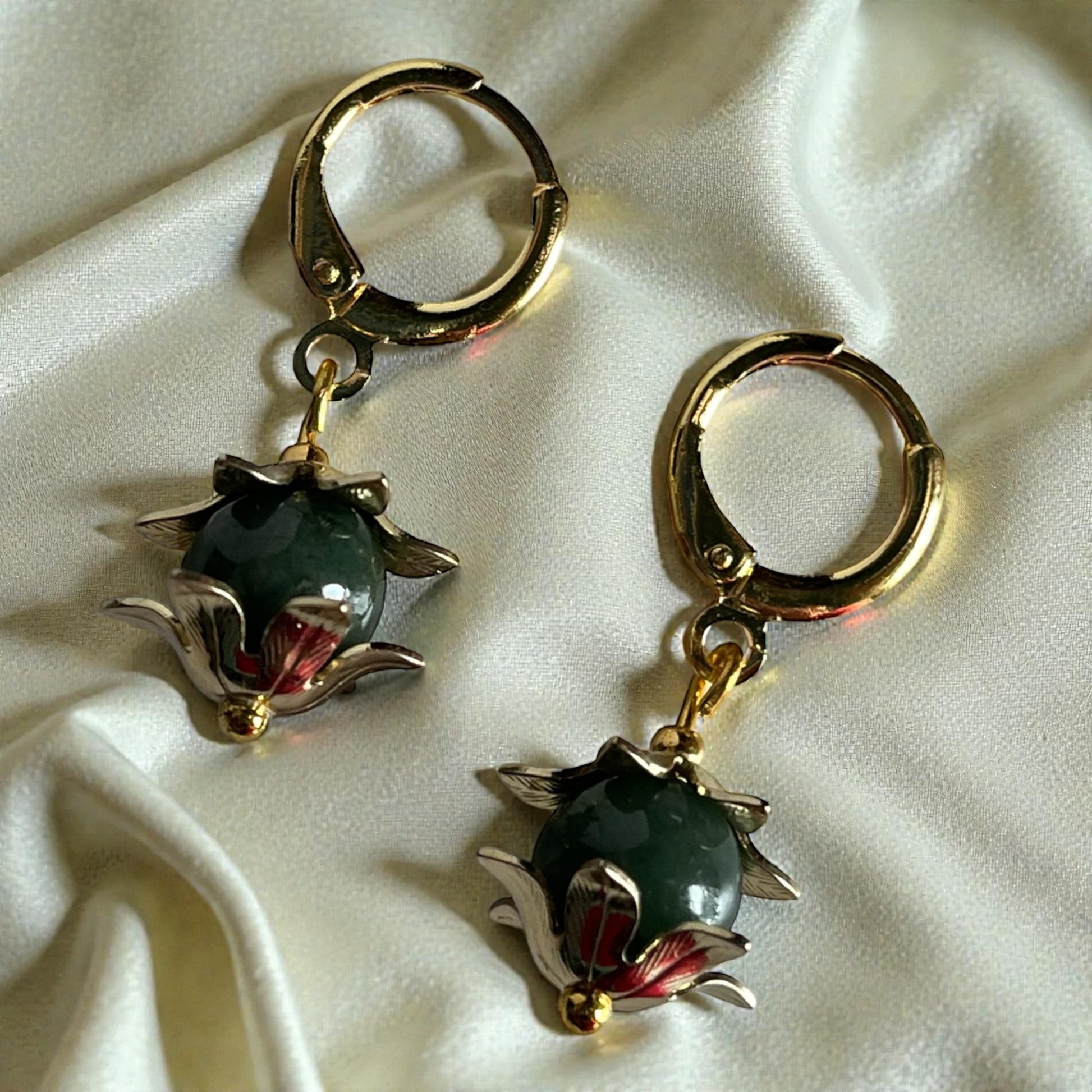 Pair of jiggie hoop earwires with Jade round beads. 