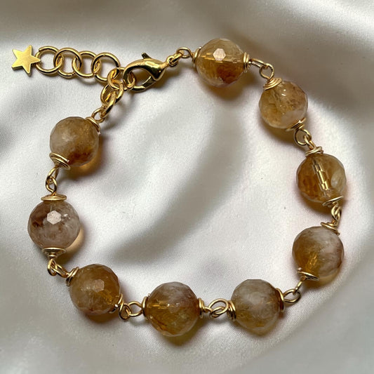 Blakeley Lane Jewelry beaded chain link bracelet with faceted citrine-toned beads, gold-tone wire, and a star charm.
