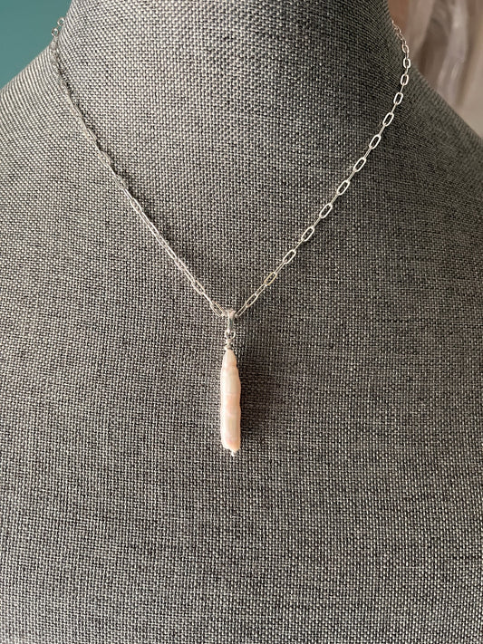 Blakeley Lane Jewelry elongated stick pearl pendant on a delicate silver link chain displayed on a grey mannequin