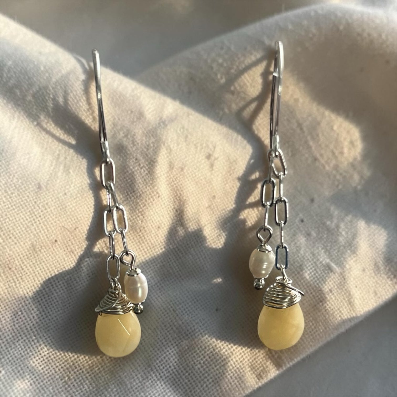 Blakeley Lane Jewelry dangling chain drop earrings with pale yellow teardrop gemstones and freshwater pearls in silver
