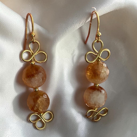 Blakeley Lane Jewelry drop earrings with honey-toned faceted gemstones and intricate gold-tone wirework loops.