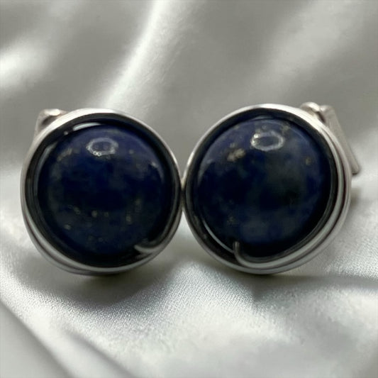 Blakeley Lane Jewelry round lapis lazuli cufflinks with deep blue stones and polished silver-tone frames.