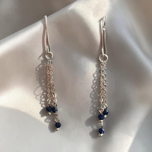 Blakeley Lane Jewelry sterling silver multi-strand chain drop earrings with deep blue sapphire beaded accents.