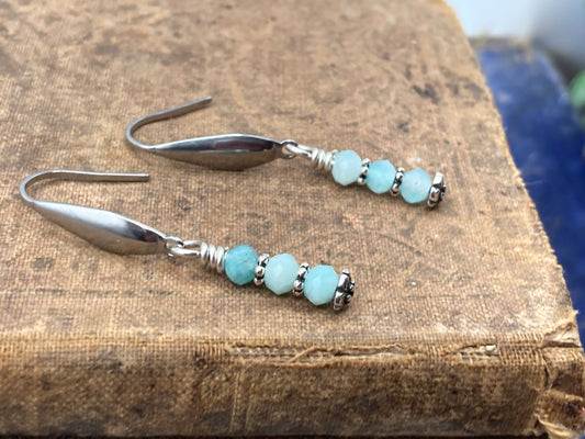 Amazonite rondelles and daisy spacer beads hang from stainless steel teardrop ear wires. These earrings are small and dainty.