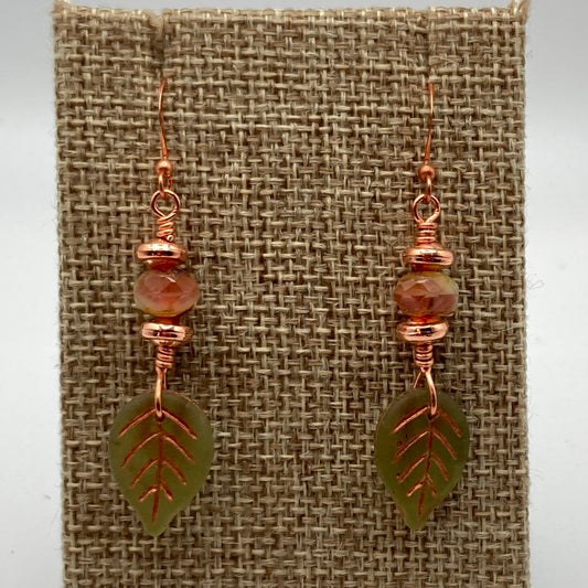 Faceted beads that are light olive and copper coordinate with the matte olive and copper-washed Czech leaf beads.  These earrings are approximately 1.5 inches long.